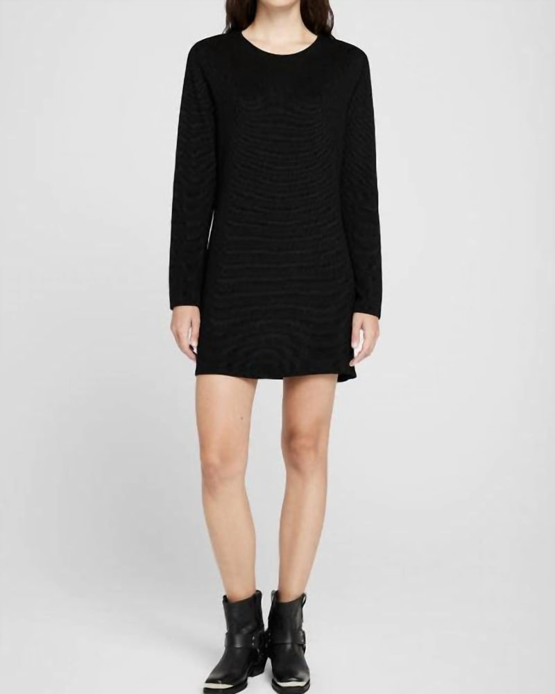 Front of a model wearing a size large Moss Dress In Black Waffle in Black Waffle by ANINE BING. | dia_product_style_image_id:344059